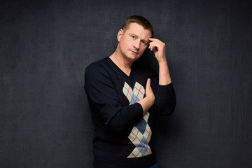 Naklejka premium Portrait of thoughtful and serious young man