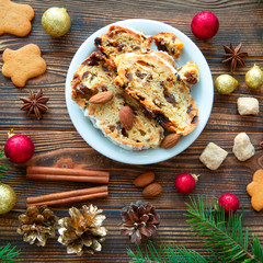 Christmas traditional cake on brown rustic table. 