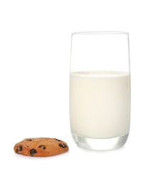 Glass of milk and tasty cookie on white background
