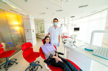 Fototapeta premium Portrait of the dentist and the patient in dentistry.