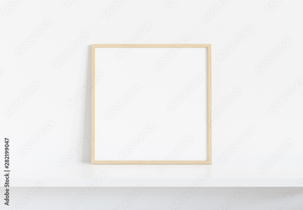 Poster wooden squared frame leaning on white shelve in interior mockup 3d rendering