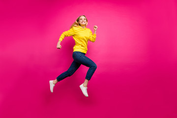 Full length photo of crazy lady jumping high running shopping wear casual outfit isolated pink background
