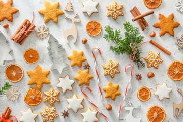 Composition with tasty Christmas cookies on light background