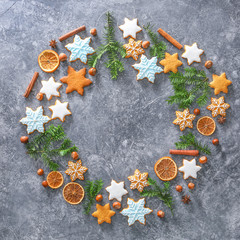 Composition with tasty Christmas cookies and place for text on grunge background