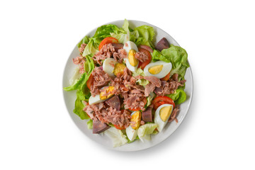 Top view. Tuna salad with lettuce, tomato sliced, boiled egg and sweet potato in white bowl isolated on white background. Healthy food to high fiber, vitamins and low carbohydrate, fat. Clipping path.
