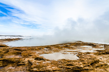 Steaming hot spring at Geysir hot spring area in Iceland