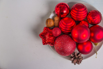 Delicate Christmas ornaments Isolated on white background.Christmas background. New year ornaments decorations background. Classic red and white baubles balls with glitter snowflakes