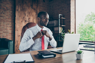 Photo of dark skin guy watching online lesson of tying necktie wear elegant costume sitting office chair