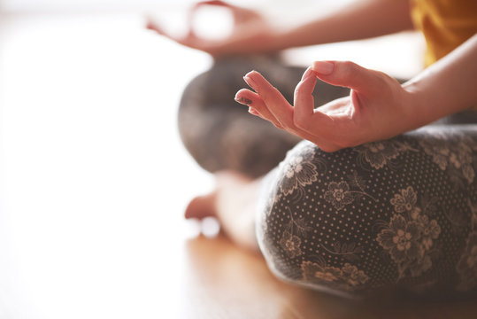 Close Up Of Hands Doing Mudra In Yoga Flow