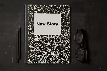 Reading, storytelling and education. Concept for writing, writer and fiction. Notebook and accessories.