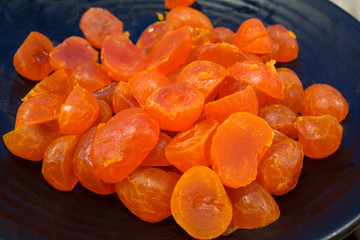 Salted egg yolk from duck made dried by sun and steamed for cooking,selective focus background.d