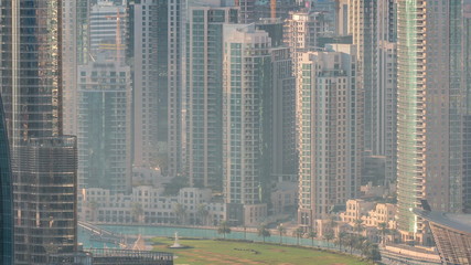 Dubai downtown during golden sunrise morning scene timelapse.