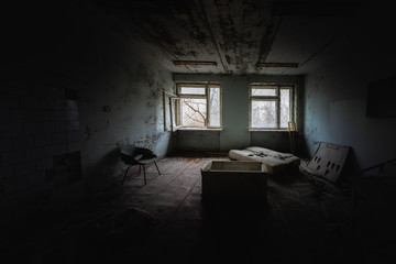 Abandoned room in destroyed hospital