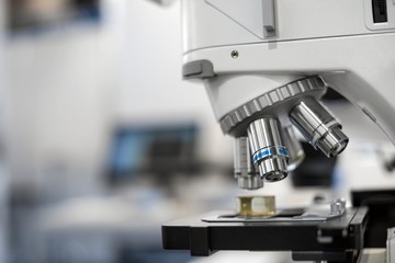 White microscope close-up photo inside laboratory