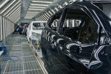 Conveyor belt carcasses of cars that check before the full Assembly at the factory