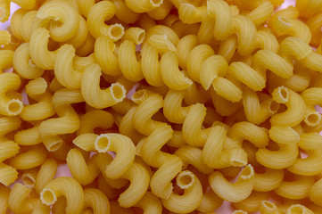 texture of pasta spiral close up. food