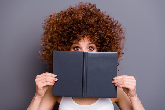 Close up photo of beautiful foxy lady book reader hide facial emotions shy person wear white tank-top isolated grey background