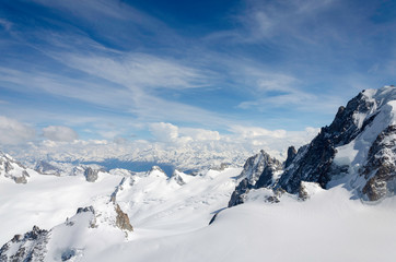 Air view. Beautiful dramatic cloudy sky , mountains and snow peaks. Mont Blanc. Chamonix. France