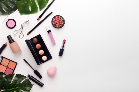Flat lay composition of cosmetics for woman daily makeup