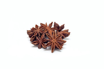 Heap of anise stars isolated on  white background