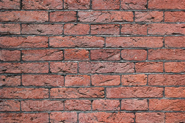 Modern rough reddish brickwork wall texture background