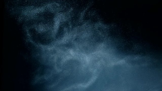 Silver ink in water Paint dropped, reacting, creating abstract cloud formations and metamorphosis on black. Art backgrounds. Slow motion. 4k