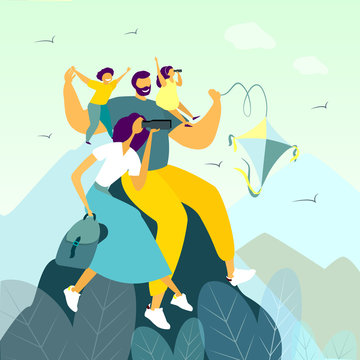 Happy family hiking in mountains with binoculars
