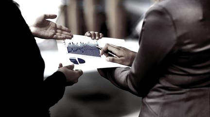 close up. managers discussing the financial profit of the company