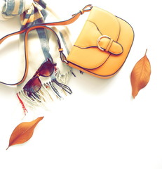 Autumn composition with women fashion  accessories top view on white background toned. Flat lay...