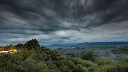 Stormy Daybreak at a Misty Bamboo Valley