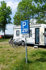 Mobile home parkingplace  with traffic sign