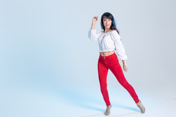 Latin dance, contemporary dance, bachata solo and cha-cha-cha concept - portrait of a young woman...
