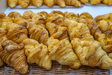 Tasty puff cheese croissants for sale at pastry shop