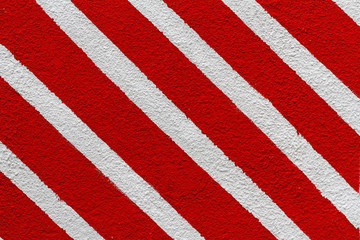 Colorful (white and red) painted striped wall as background or texture