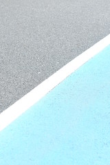 Fototapeta premium ブルーとグレーのアスファルト道路