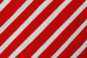 Colorful (white and red) painted striped wall as background or texture