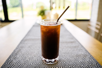 Closeup a glass of iced americano
