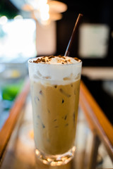 Closeup a glass of iced cappucino