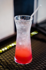 Closeup a glass of strawberry italian soda