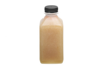 Cold-pressed juice in the bottle plastic isolated on white background.