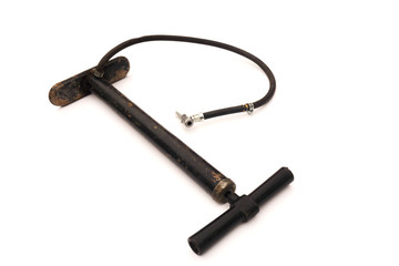 old, black hand pump isolated on white background