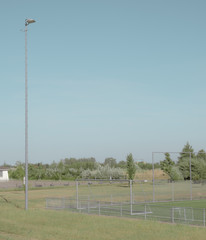 football field and blue sky
