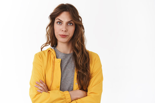 Displeased serious-looking bossy female entrepreneur dislike employees diagrame smirking disapproval frowning annoyed cross arms chest frustrated bad company results standing white background