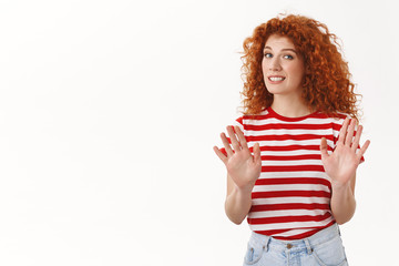 No thanks pass. Reluctant fashionable redhead curly girl 25s ginger hair wave raised hands refusal aversion gesture doubtful unwilling take offer rejecting displeasing suggestion, white background