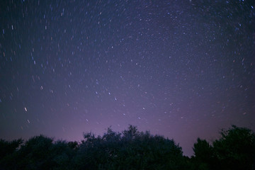 Fototapeta na wymiar view on traces of stars around Polar star at night