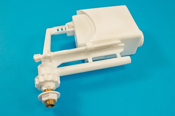 Float for toilet valve mechanism and tank water flashing isolated on blue