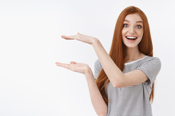 Lively amused happy cheerful redhead woman blue eyes smiling delighted impressed showing awesome...
