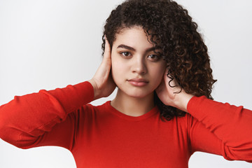 Close-up serious-looking fed up young female femenist unwilling hear violation human rights close...