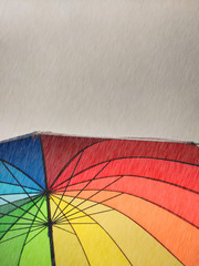 Rainbow umbrella in a rainy day