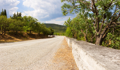 Fototapeta na wymiar panorama of the twisting road in mountains